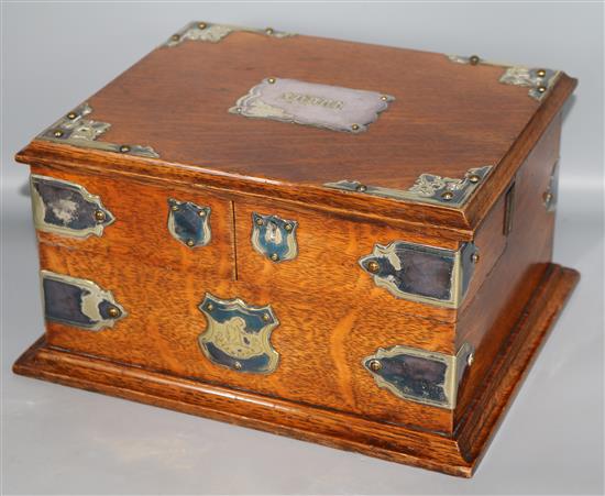 A silver plated Oak stationary box